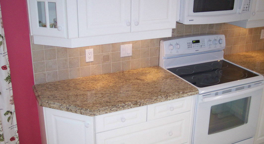 Giallo Ornamental On White Cabinets Northern Marble