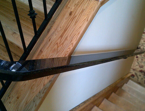 Black Pearl Custom Handrail – Bevel Edge Profile Atop Iron Banister