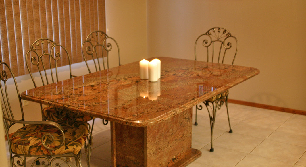 Juperana Bordeaux Granite Table with Matching Pedestal Base